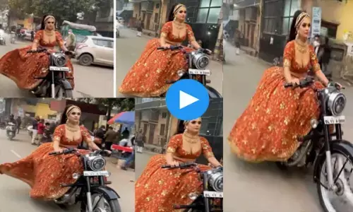 VIDEO: बुलेट पर निकली दुल्हन, स्वैग देखकर लोग हुए हैरान....अब वीडियो इंटरनेट पर हो रहा जमकर वायरल