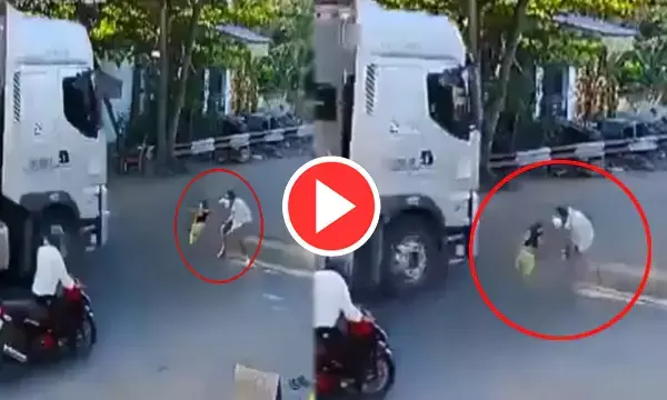 ट्रक के सामने दौड़ रहे बच्चे को शख्स ने बचाया, रोंगटे खड़े कर देगा वीडियो.. देखें