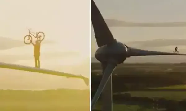 खौफनाक स्टंट VIDEO:  विंड टर्बाइन के पंख पर शख्स ने चलाई साइकिल, विडियो देख आप भी दांग