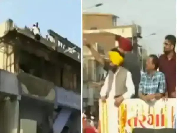 VIDEO: मुख्यमंत्री को देखने छत से लटक गया युवक... देखें, इस तरह से बची जान