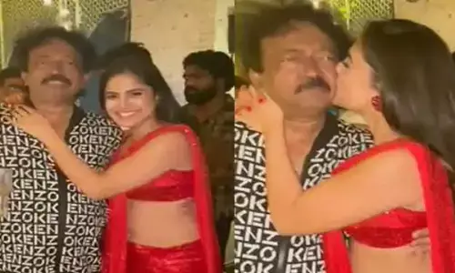 कौन है ये लाल साड़ी में हसीना!... देर रात पार्टी में इस महिला ने राम गोपाल वर्मा को किया KISS, वीडियो हुआ वायरल... देखे