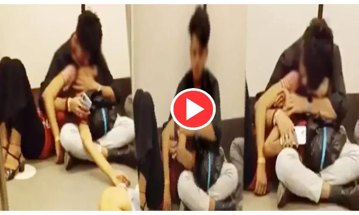 VIDEO-मेट्रो ट्रेन में लिपलॉक: गर्लफ्रेंड को गोद में लिटाकर लड़के ने की अश्लील हरकत, सरेआम की बेशर्मी की हद पार...