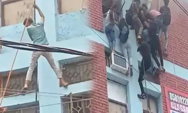 बिल्डिंग में लगी आगः कोचिंग सेंटर के बच्चों ने खिड़की से कूदकर बचाई अपनी जान, देखें वीडियो