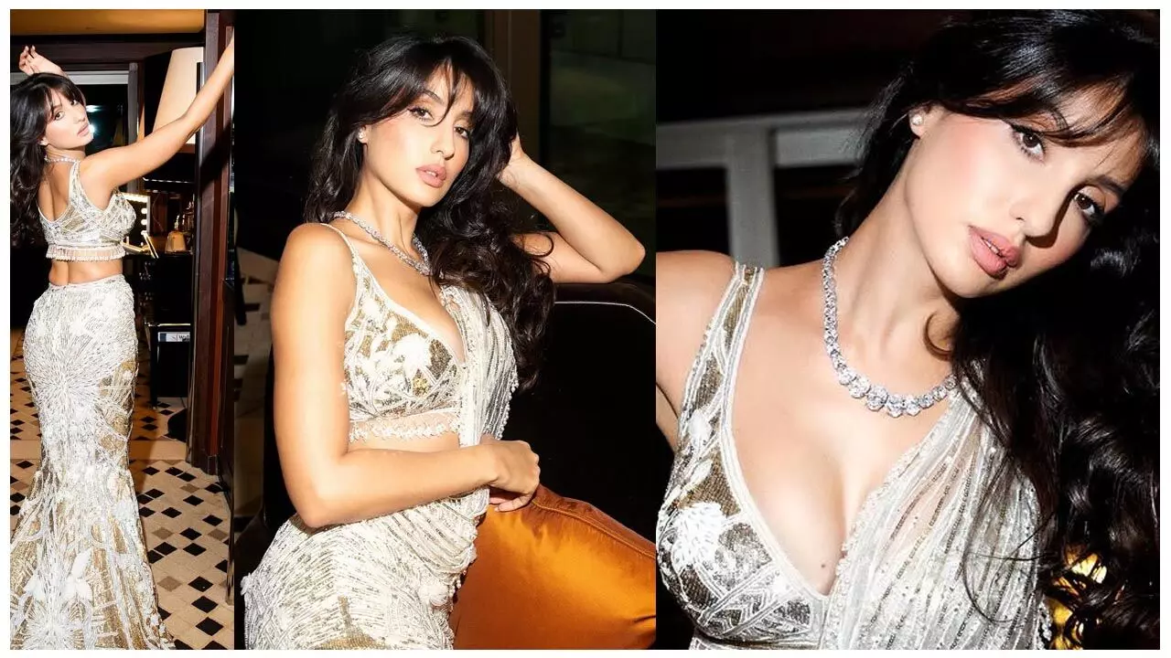 Nora Fatehi Photos: चमकदार साड़ी में बेबी डॉल बन नोरा ने लूटी महफिल, देसी लुक देख लोगों ने बांध तारीफों का पुल, देखिए...