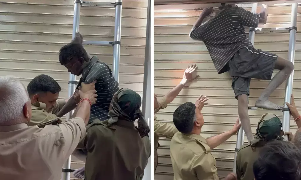 Viral Crime News: चोरी करने गया चोर क्लीनिक के शटर में फंसा, रात भर लटकता रहा, सुबह फायर ब्रिगेड ने निकाला, पुलिस ने ऐसे किया गिरफ़्तार!