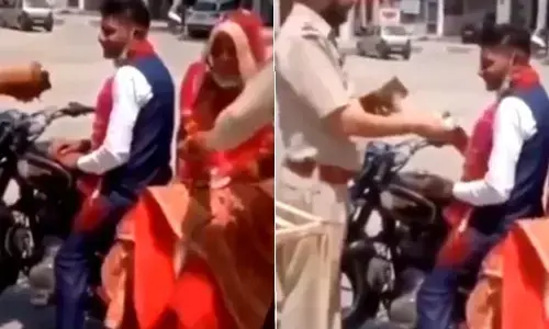 VIDEO : दुल्हा शादी के बाद दुल्हन को बाइक से लेकर लौट रहा था……पुलिस ने रोका, माला पहनायी, फिर शगुन भी दिया…. IPS दीपांशु काबरा ने किया ट्वीट